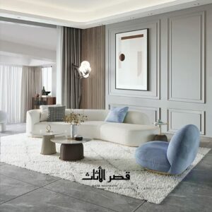 ركنة عصرية منحنية مع طاولات جانبية