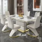 ⁦طاولة طعام مع كراسي بتصميم رائع⁩ - الصورة ⁦5⁩