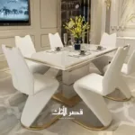⁦طاولة طعام مع كراسي بتصميم رائع⁩ - الصورة ⁦2⁩